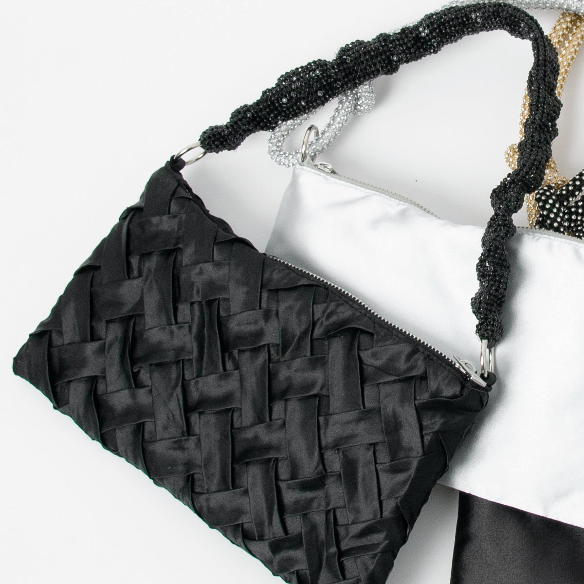 861201 Vesker, PARTY flettet bag satin  - svart