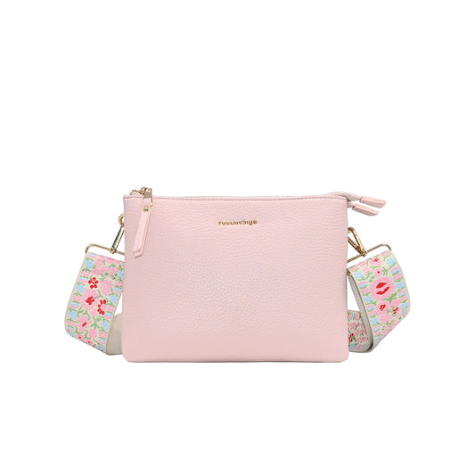 930736 Veske, NOOSA clutch m/mønstret rem - rosa