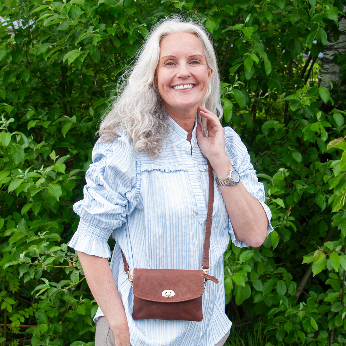 844511 Veske LONDON liten skinn clutch med frontlomme - brun